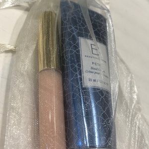 Brand new mini lip gloss/hand cream with gift bag!